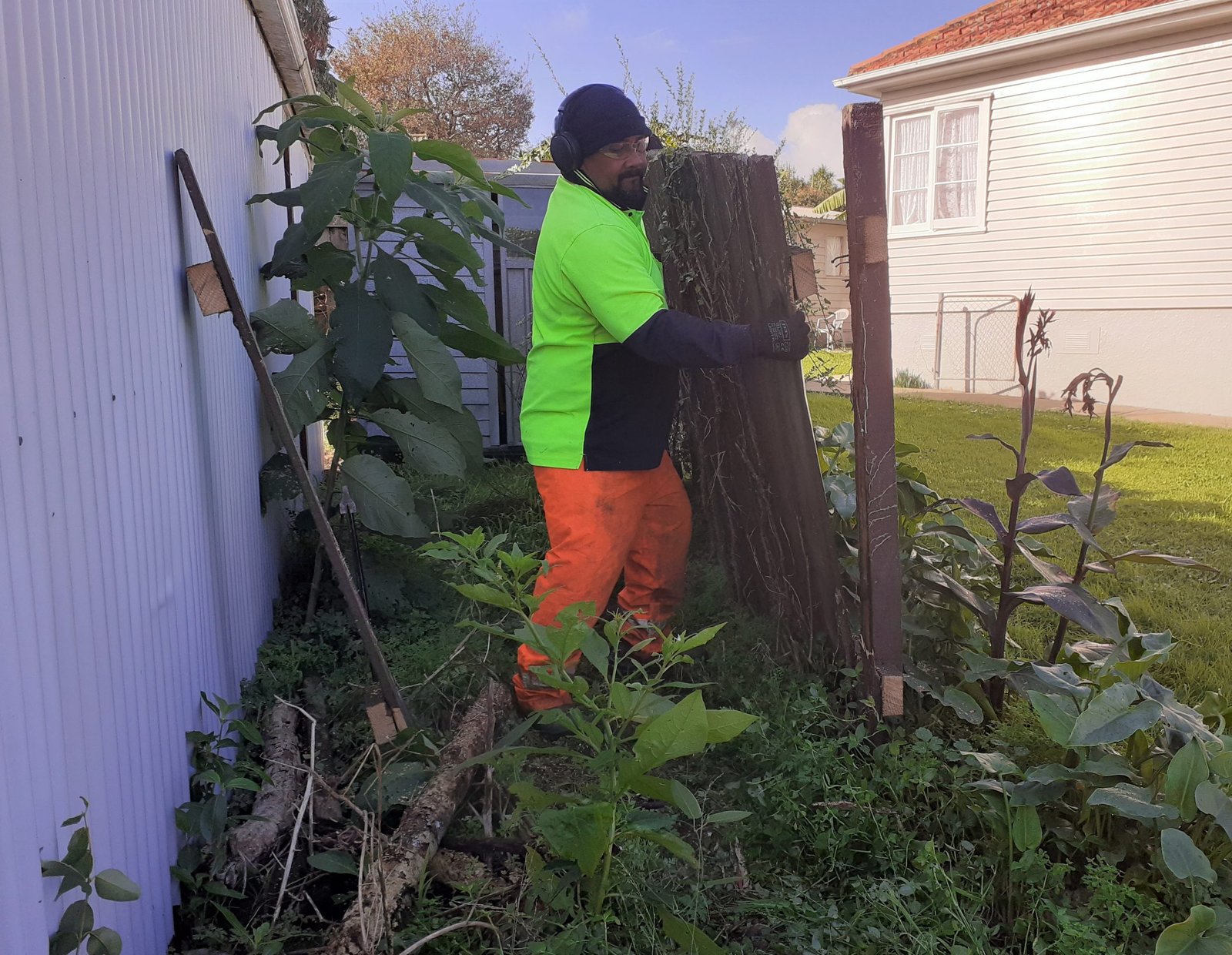 Completed fence run alongside house