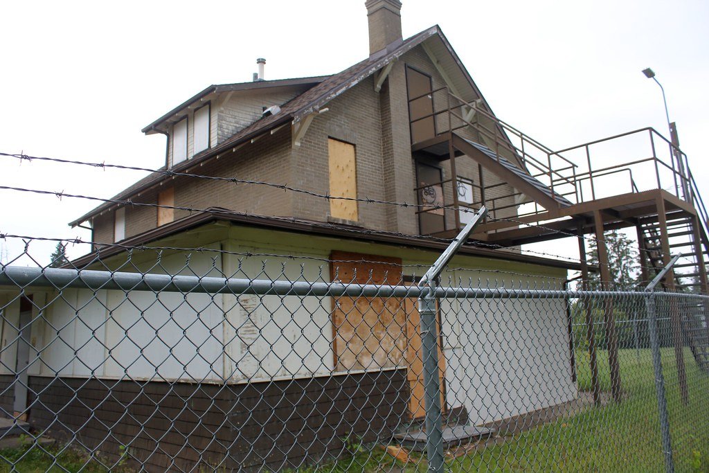 Timber fence with house, Auckland